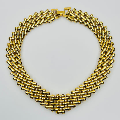 V-shaped gold-tone choker necklace with faux pearls in stacked link design