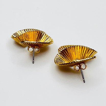 Gold tone sculptural swirl pierced stud earrings