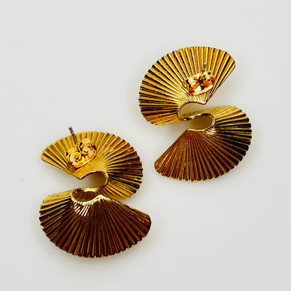 Gold tone sculptural swirl pierced stud earrings