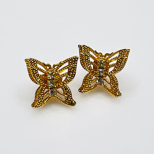 Vintage gold filigree butterfly stud earrings with rhinestone accents