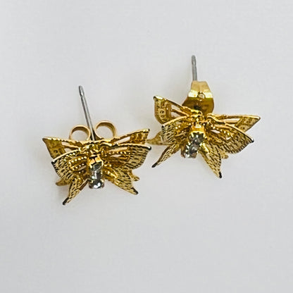 Vintage gold filigree butterfly stud earrings with rhinestone accents