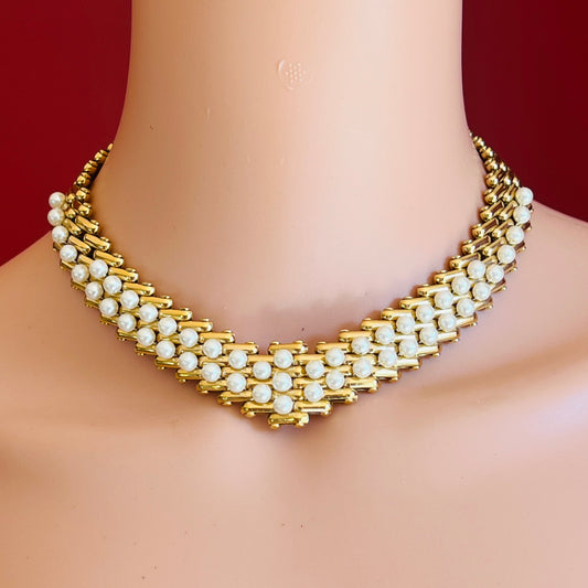 V-shaped gold-tone choker necklace with faux pearls in stacked link design