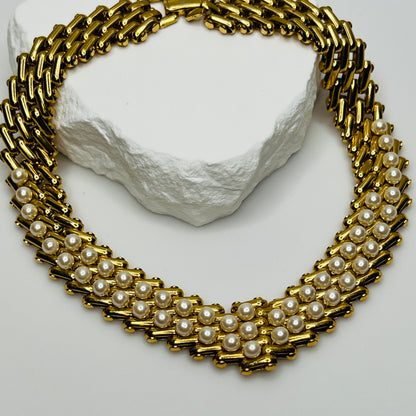 V-shaped gold-tone choker necklace with faux pearls in stacked link design