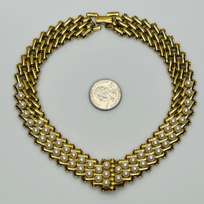 V-shaped gold-tone choker necklace with faux pearls in stacked link design