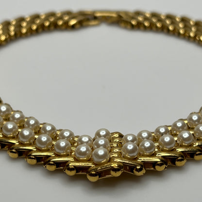 V-shaped gold-tone choker necklace with faux pearls in stacked link design