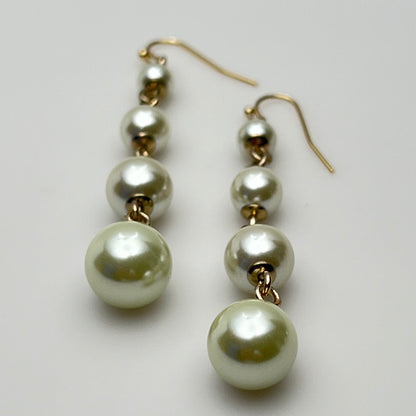 Vintage Lulu Frost long dangle earrings with graduated faux pearls on gold-tone wires