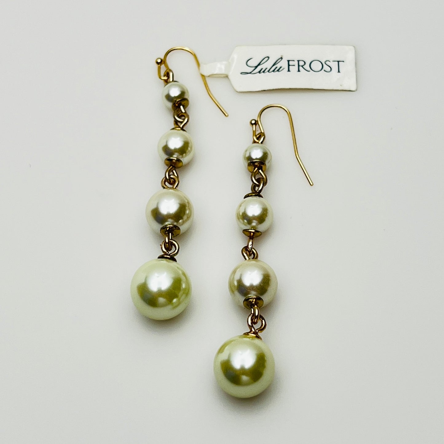 Vintage Lulu Frost long dangle earrings with graduated faux pearls on gold-tone wires