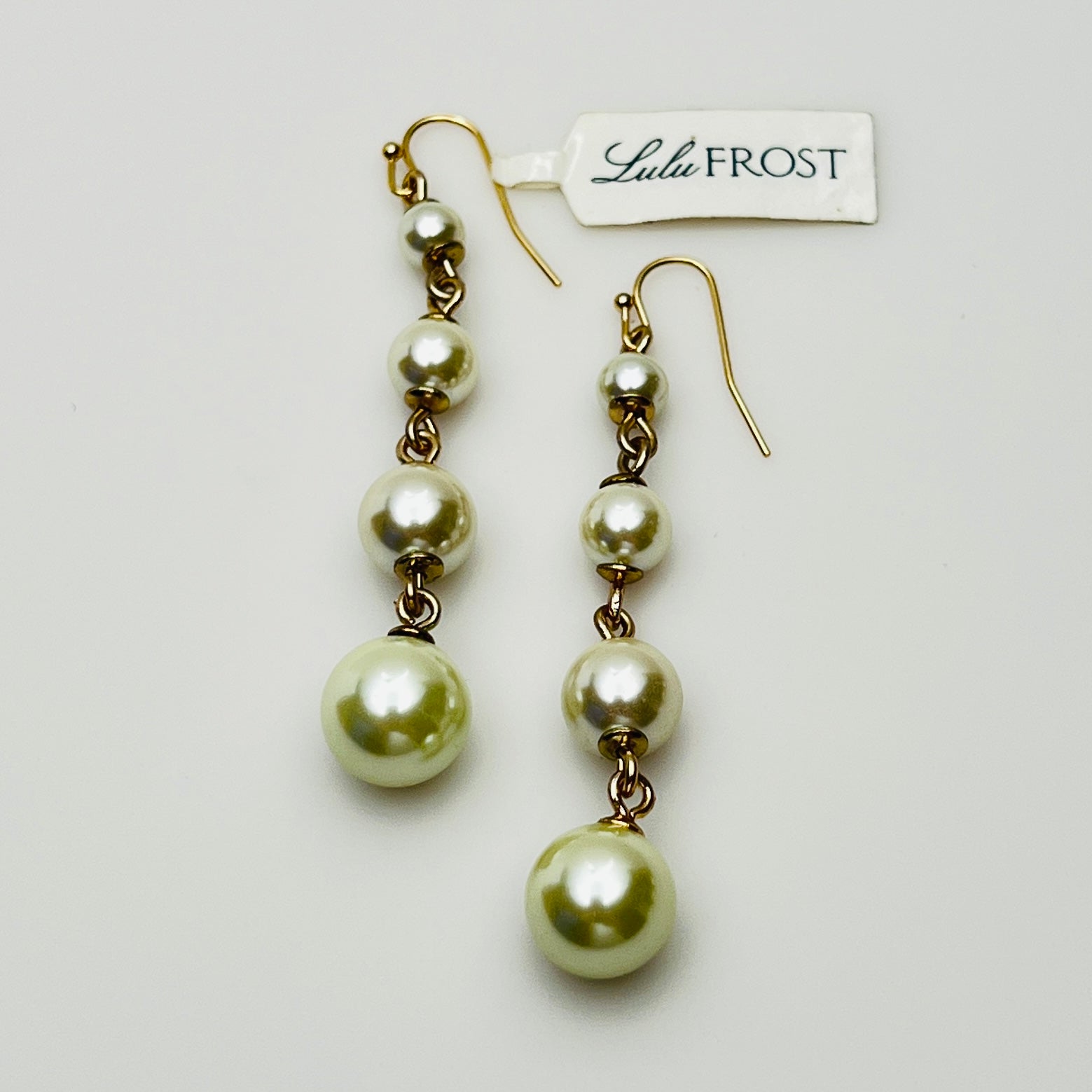 Vintage Lulu Frost long dangle earrings with graduated faux pearls on gold-tone wires