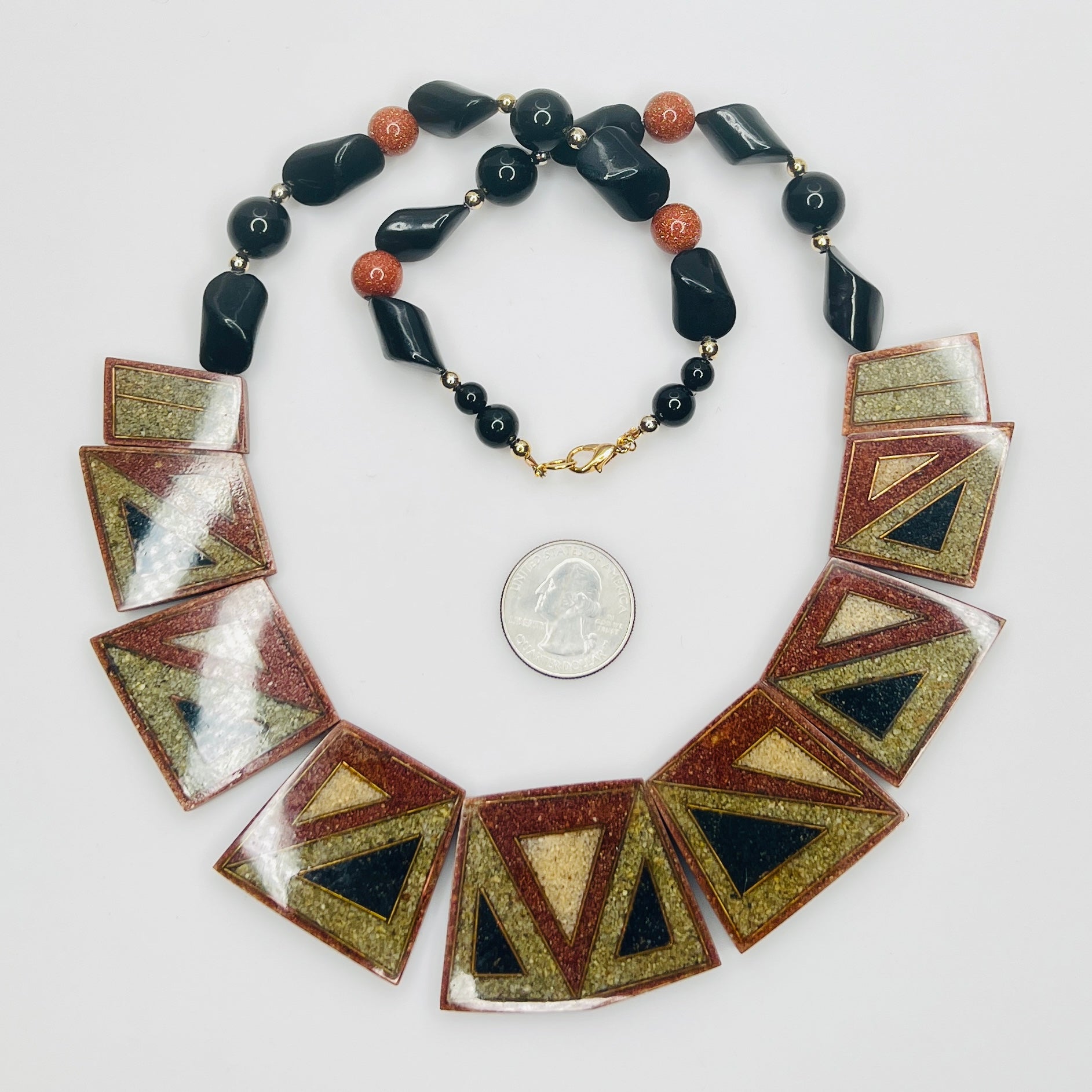 Front view of reversible terracotta and olive tile necklace
