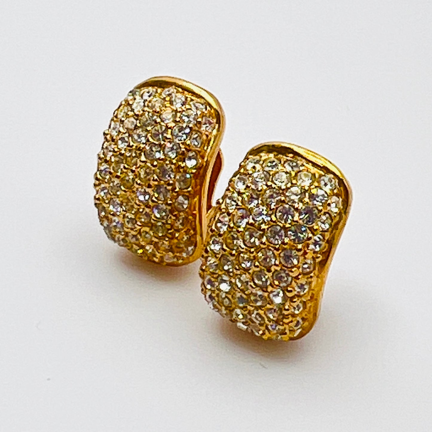 Close-up of vintage Roman earrings with sparkling rhinestones