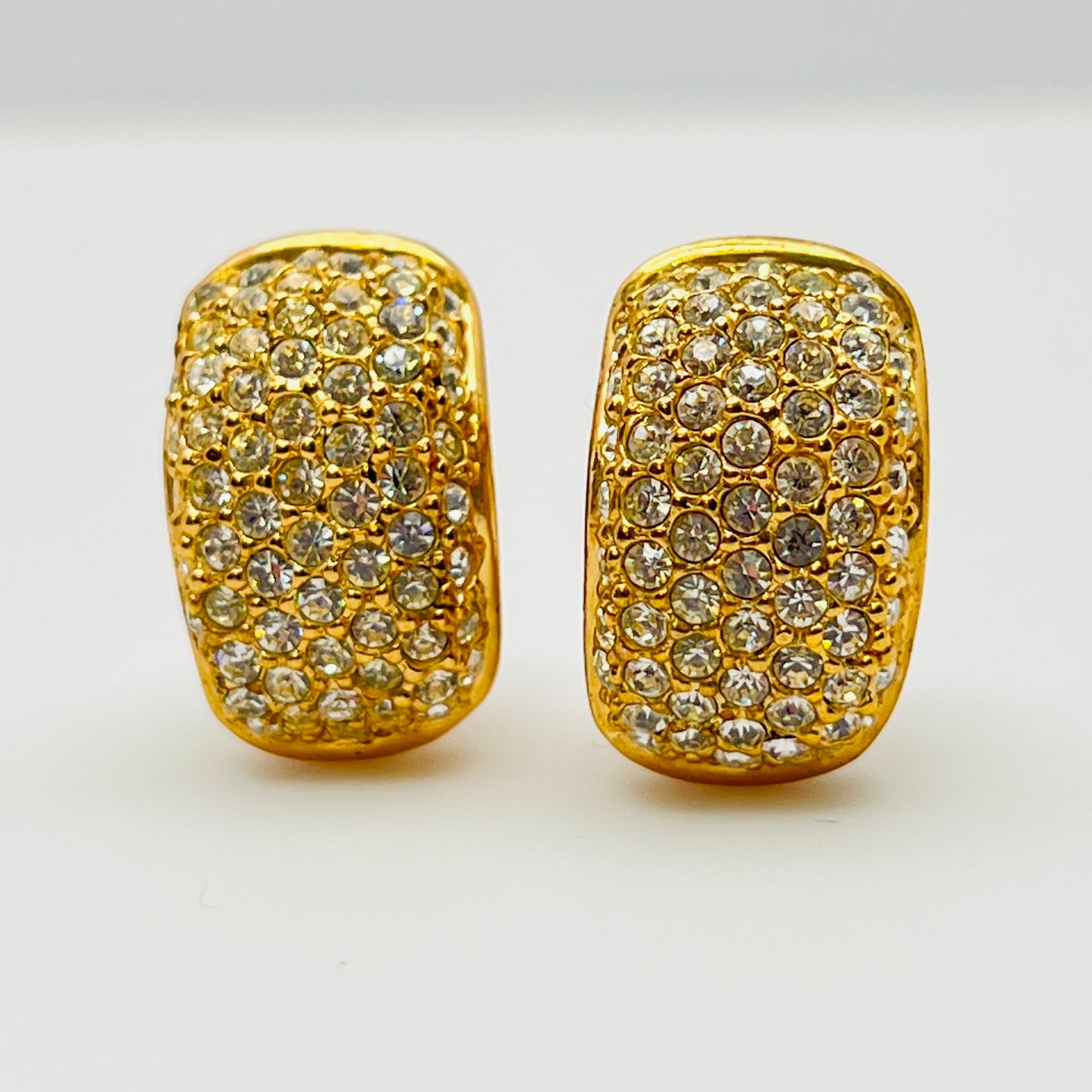 Close-up of vintage Roman earrings with sparkling rhinestones