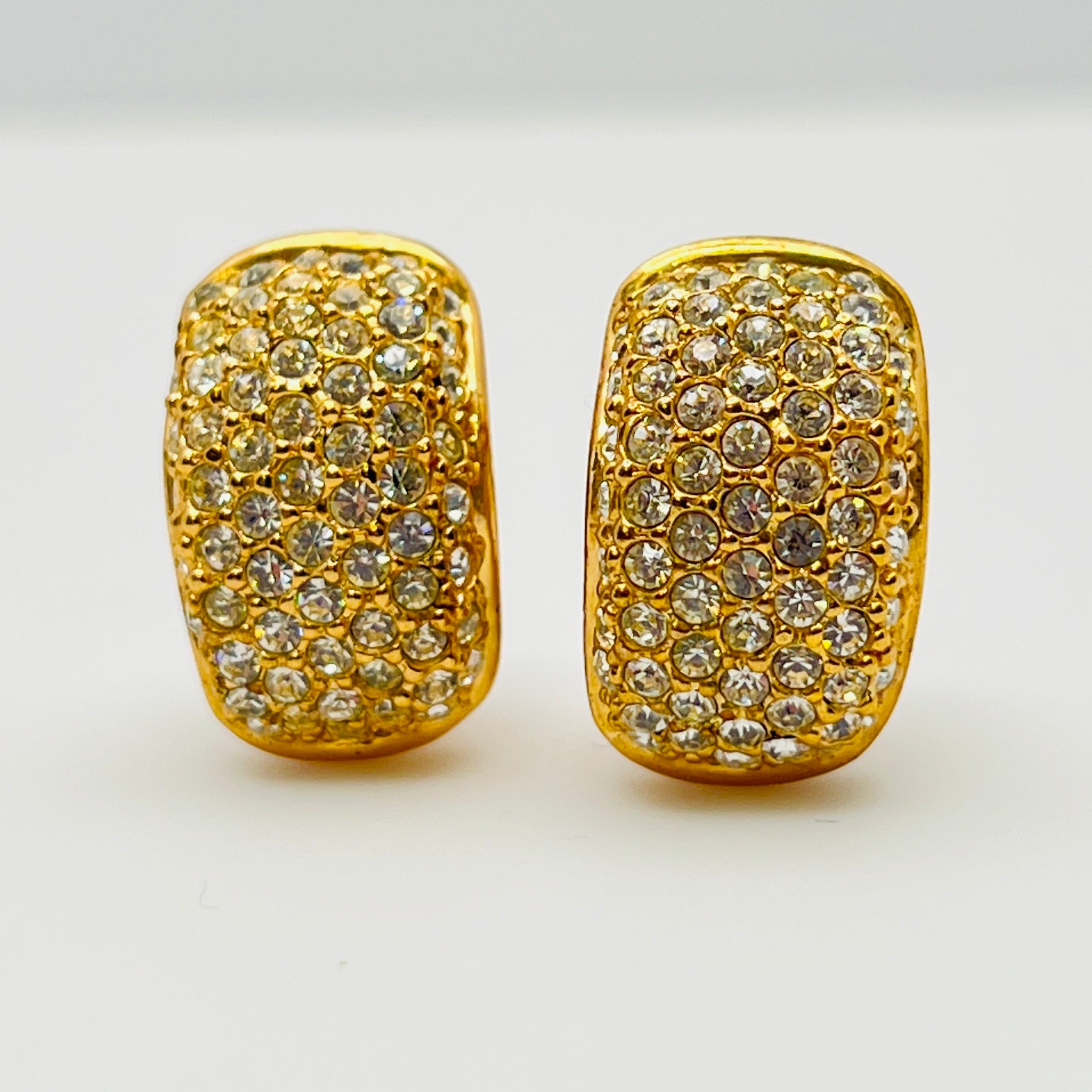 Close-up of vintage Roman earrings with sparkling rhinestones