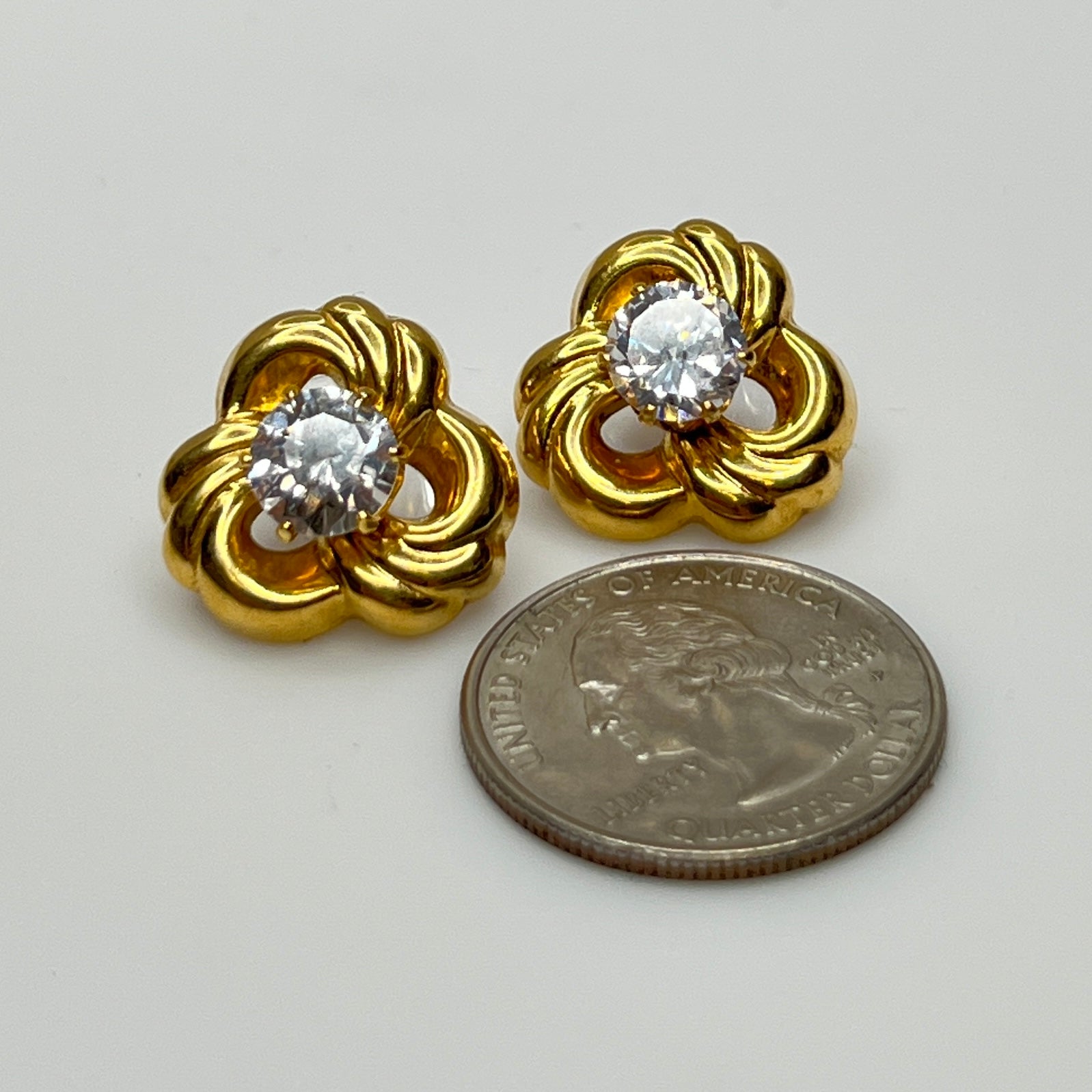 Convertible gold swirl earrings with clear crystal studs, 1980s