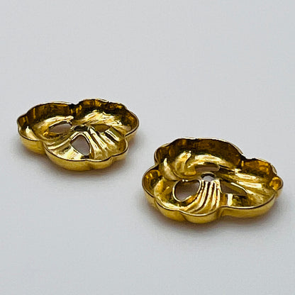 removable gold-tone swirl jackets