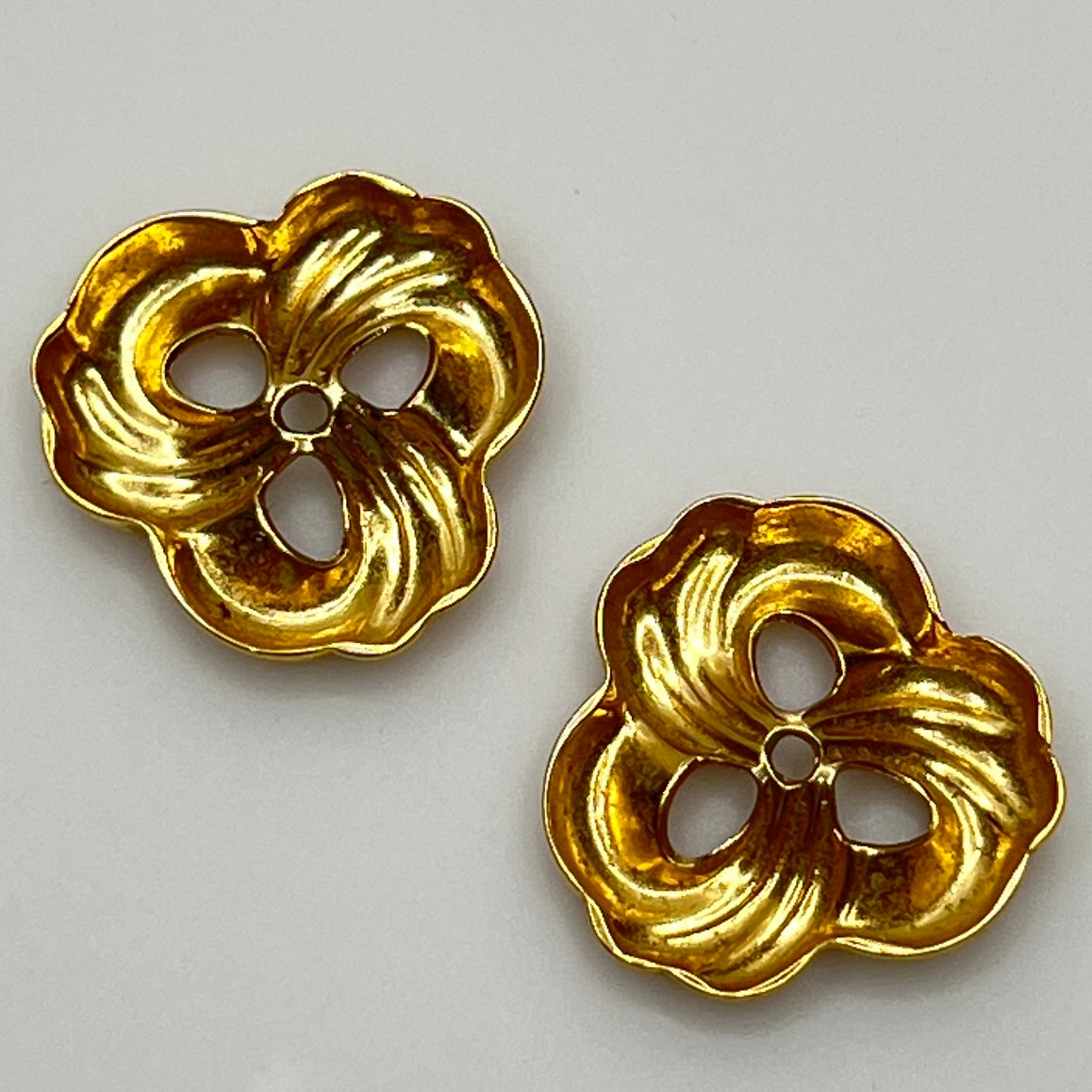 removable gold-tone swirl jackets