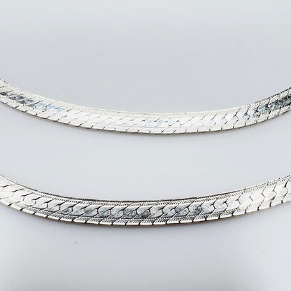 Detail of textured sterling silver snake chain links