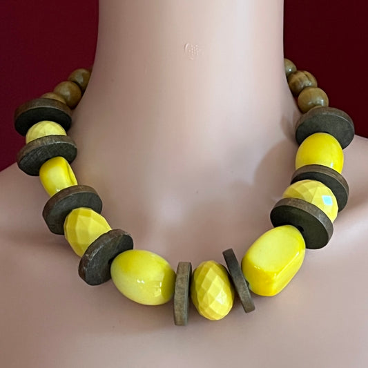 Yellow lucite and wood bead necklace with faceted and smooth beads