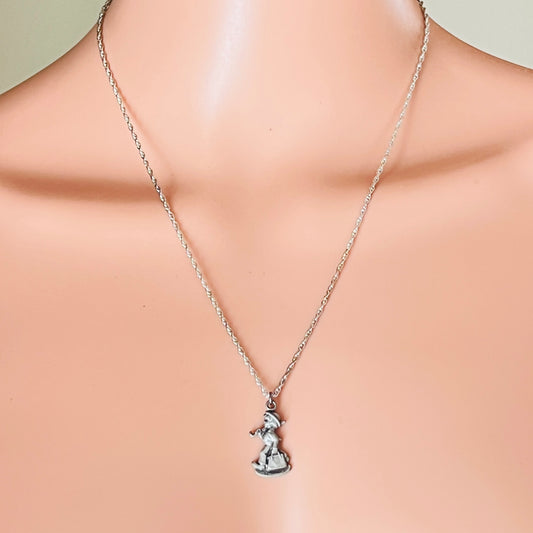 Sterling silver Hummel girl pendant necklace on mannequin bust
