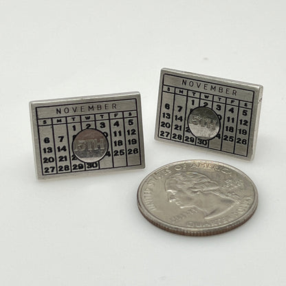 Vintage Anson cufflinks and tie clip set with November calendar design
