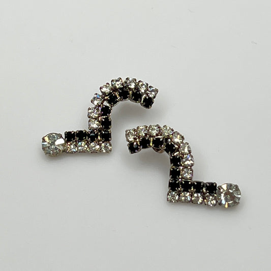 Art Deco-style vintage rhinestone earrings in black and clear zigzag shape