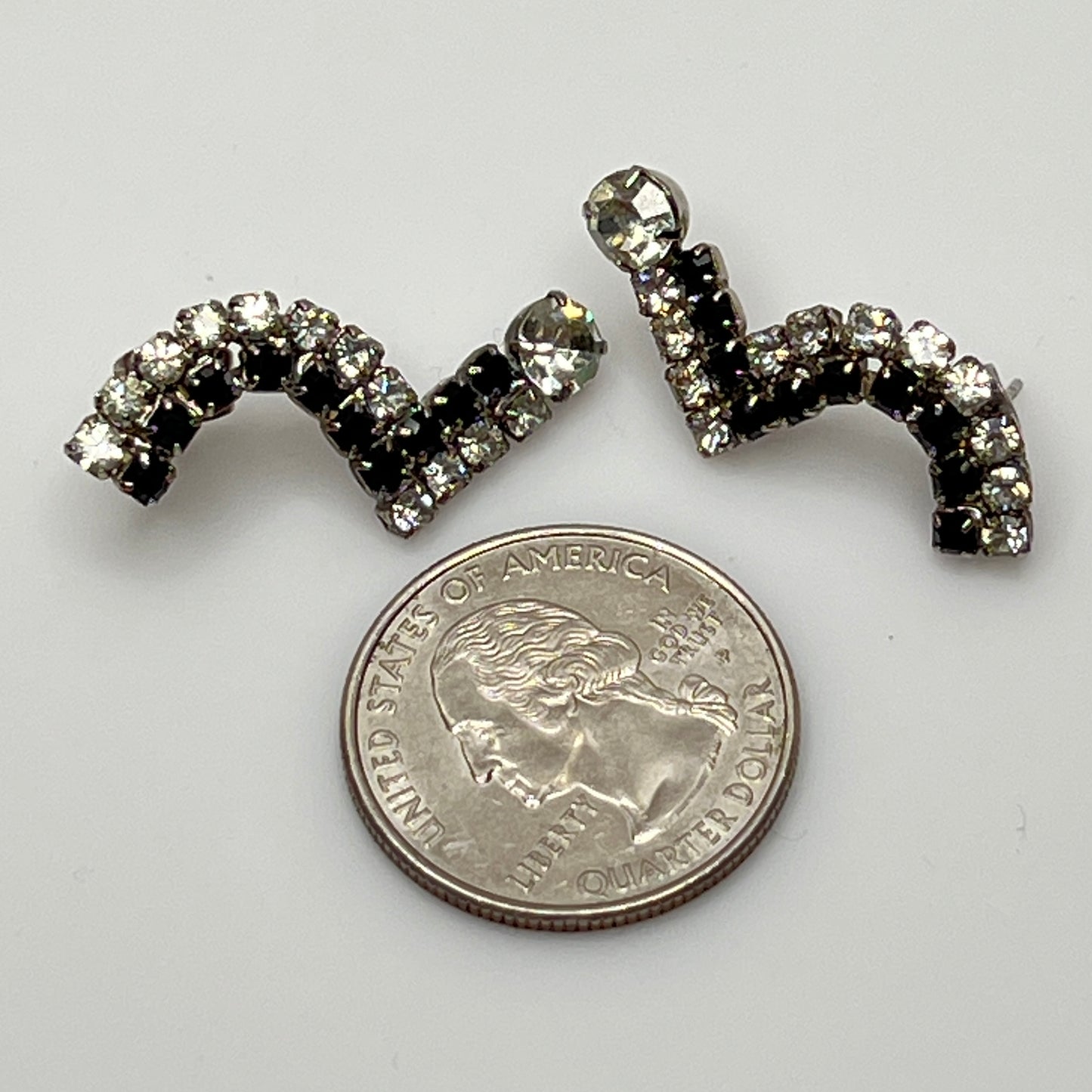 Pierced stud earrings with prong-set rhinestones and butterfly backs