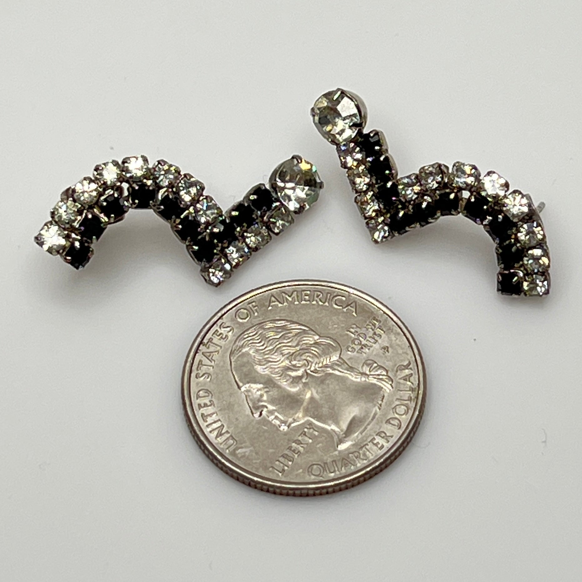 Pierced stud earrings with prong-set rhinestones and butterfly backs