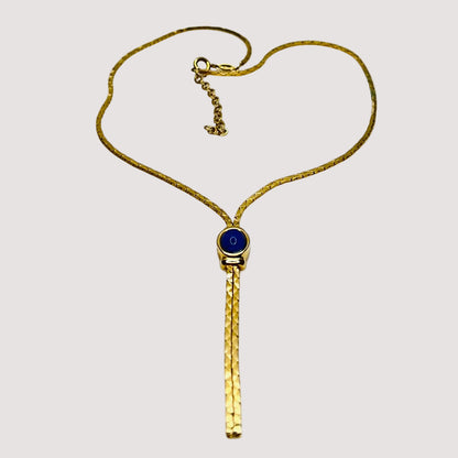 Full view of necklace with lariat drop and blue stone on white background