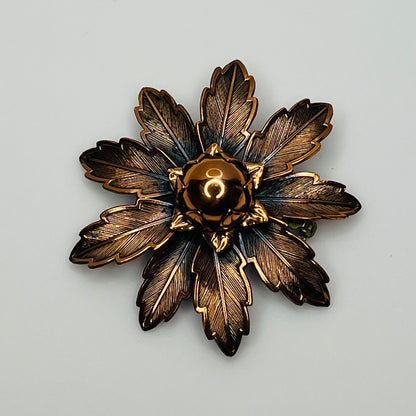 Vintage Copper Bell brooch with leaf motif and domed center flower