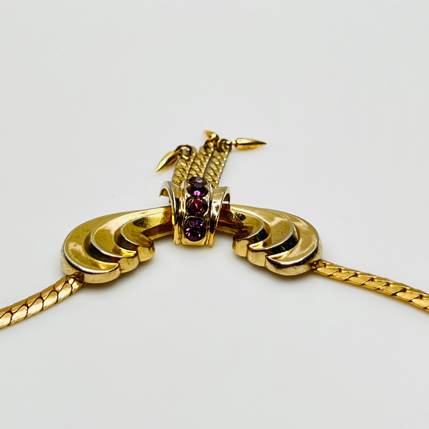 Vintage gold tone choker with purple glass rhinestones