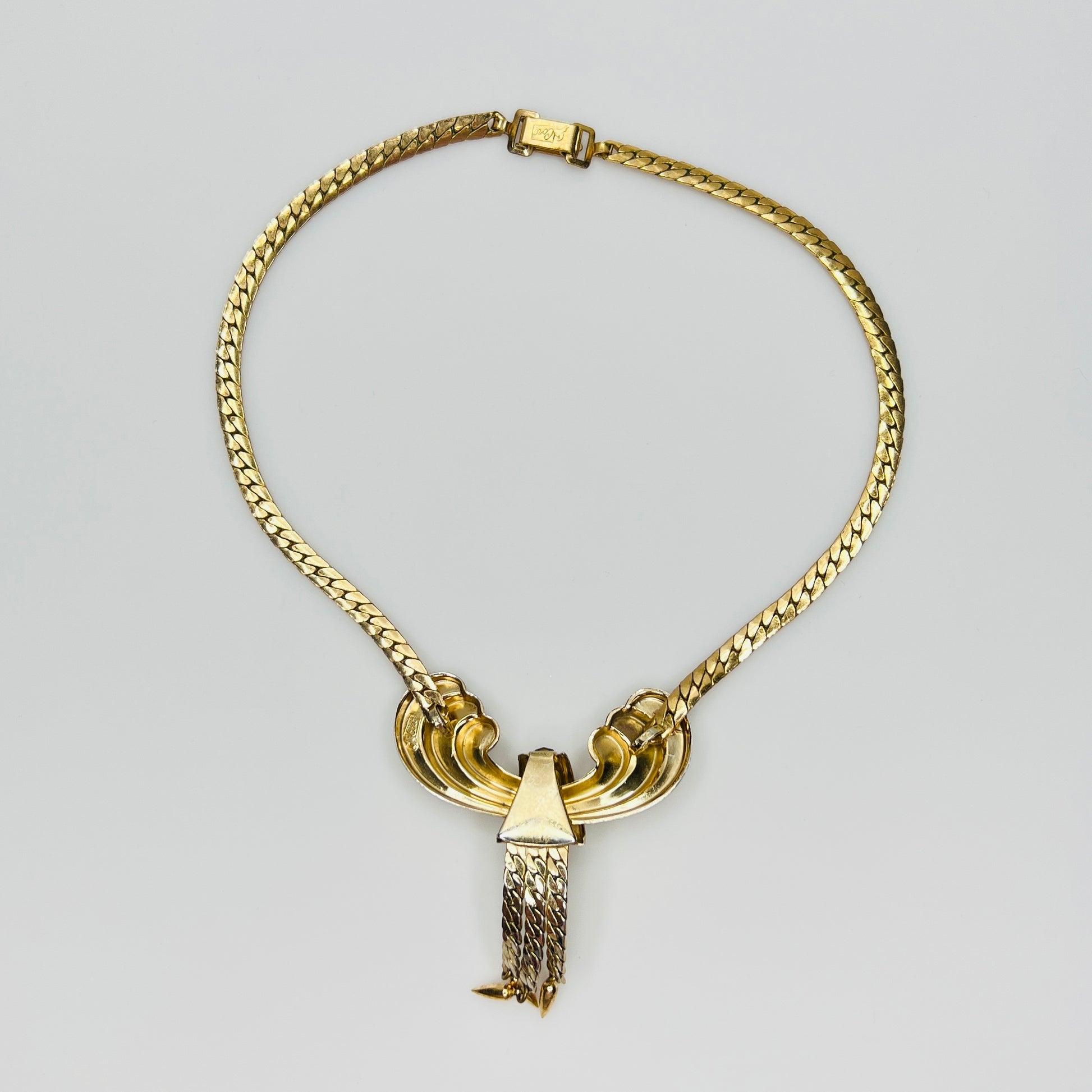 Vintage gold tone choker with purple glass rhinestones