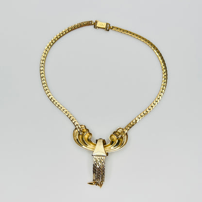 Vintage gold tone choker with purple glass rhinestones
