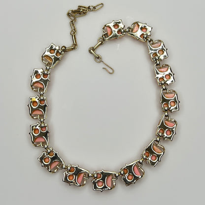 back of Coro Lucite confetti necklace with peach iridescent panels, gold-tone setting