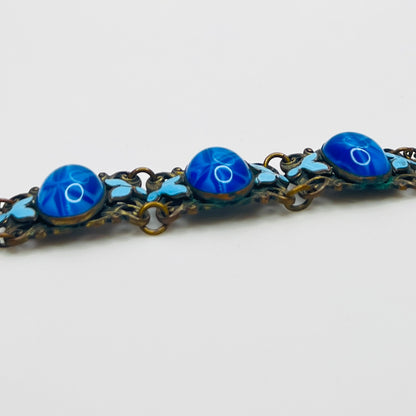 Vintage Czech starburst glass panel bracelet with enamel detail
