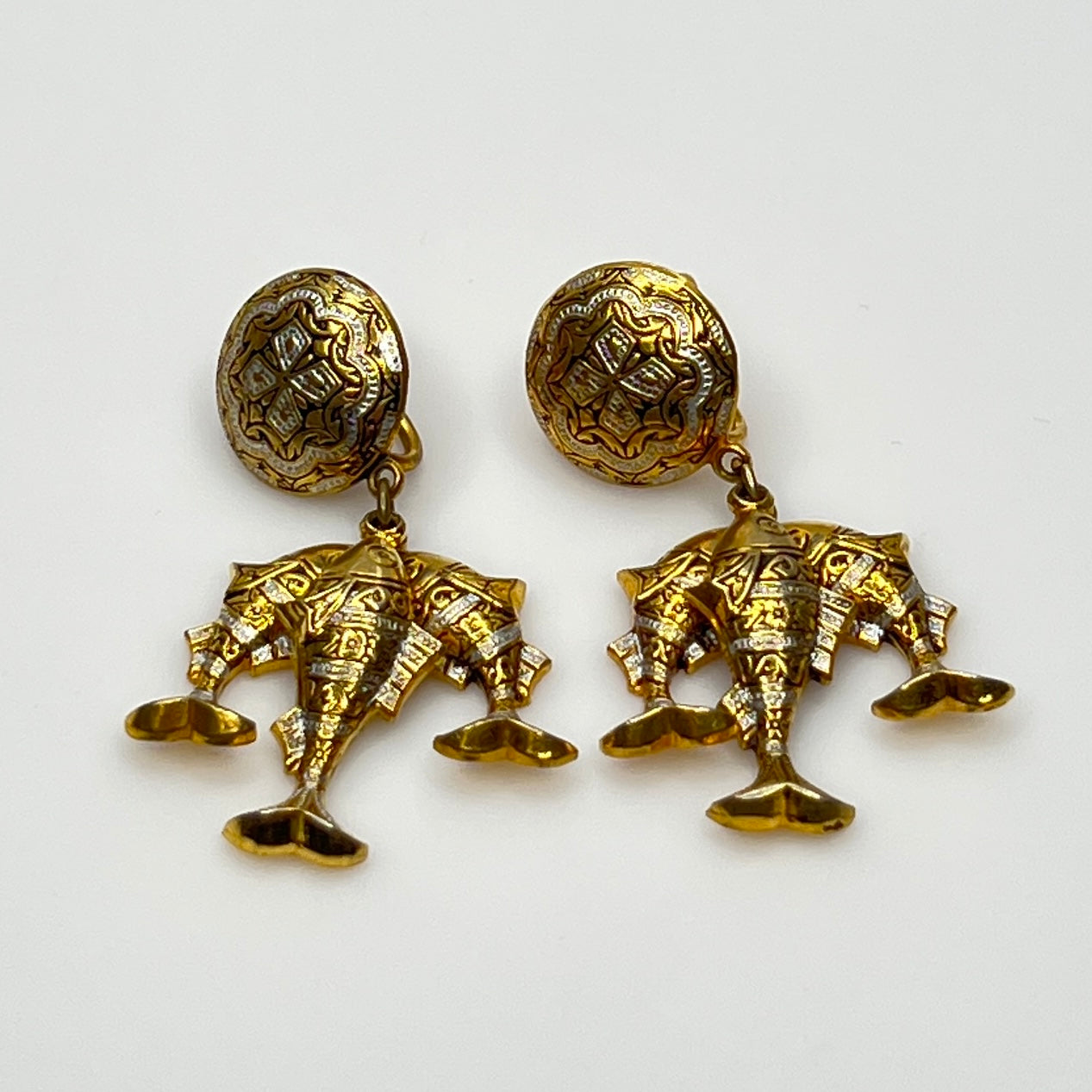 Vintage damascene screw-back earrings with three gold-tone fish drops