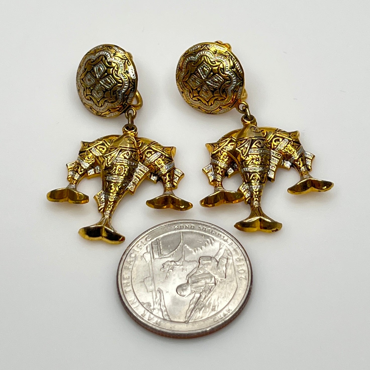 Vintage damascene screw-back earrings with three gold-tone fish drops