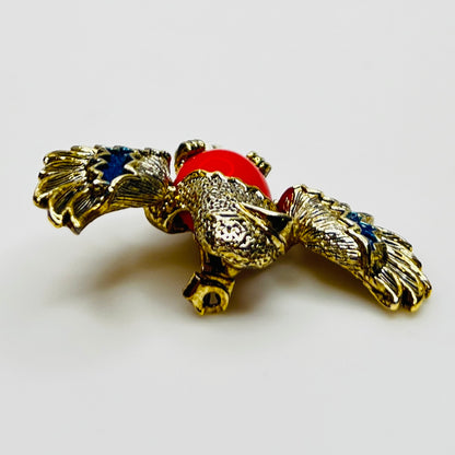 Side view of enamel wing detail on vintage eagle pin