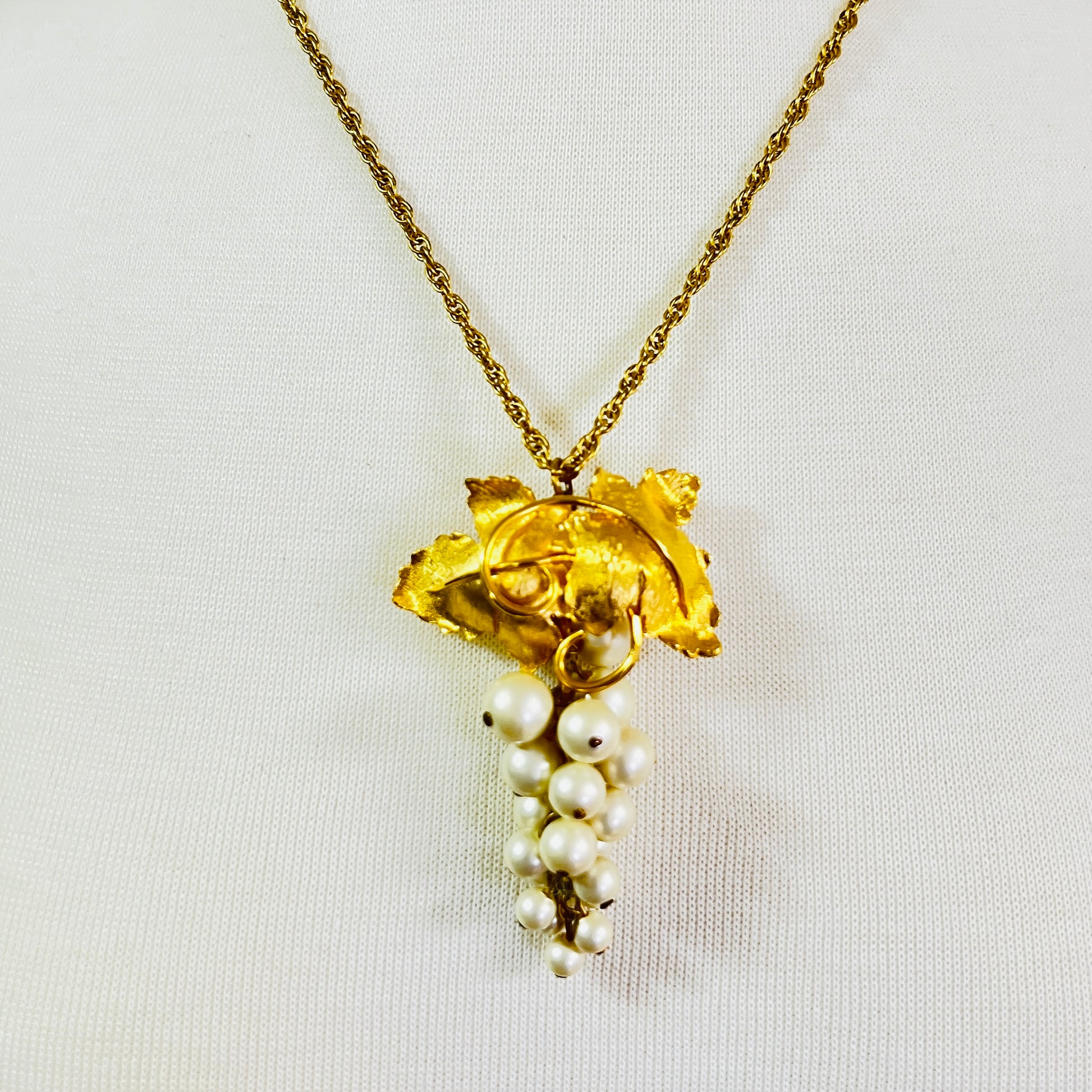 Close-up of 1950s faux pearl grape cluster convertible pendant