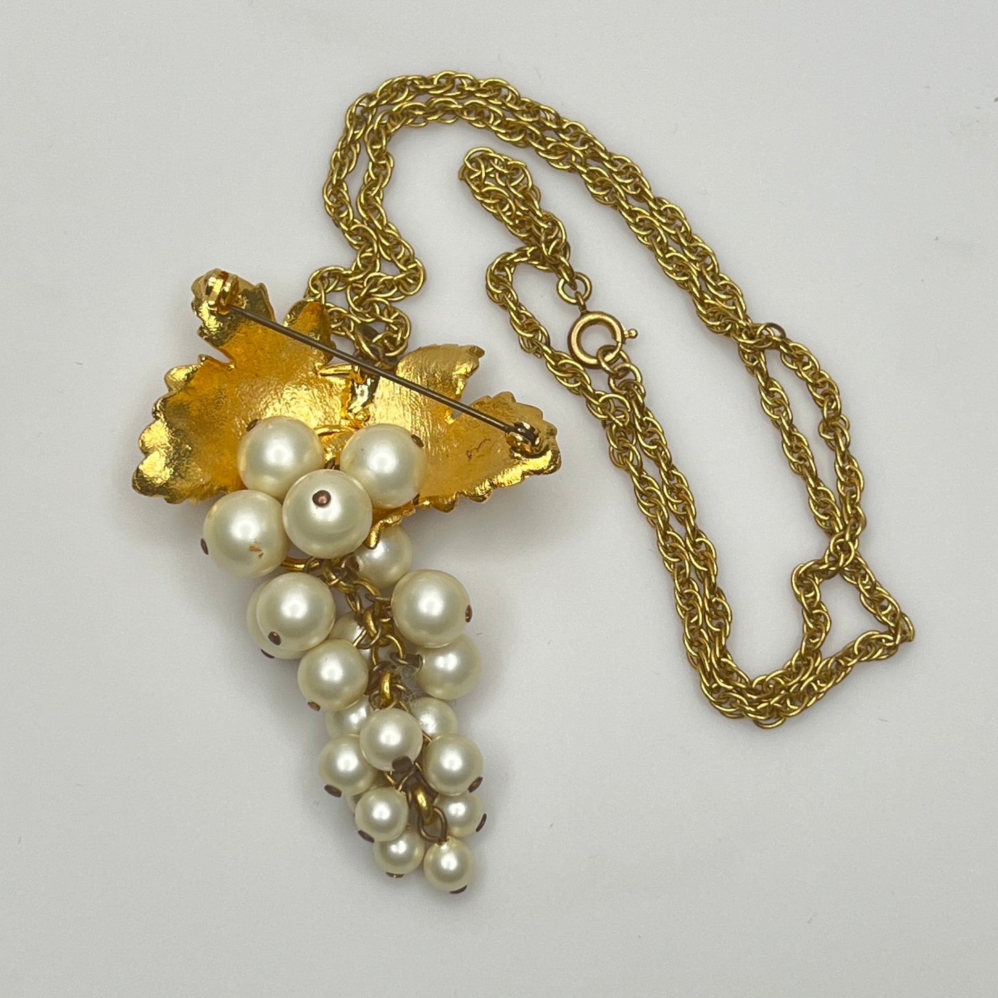 Vintage gold-tone grape cluster pendant brooch and faux pearl earrings set