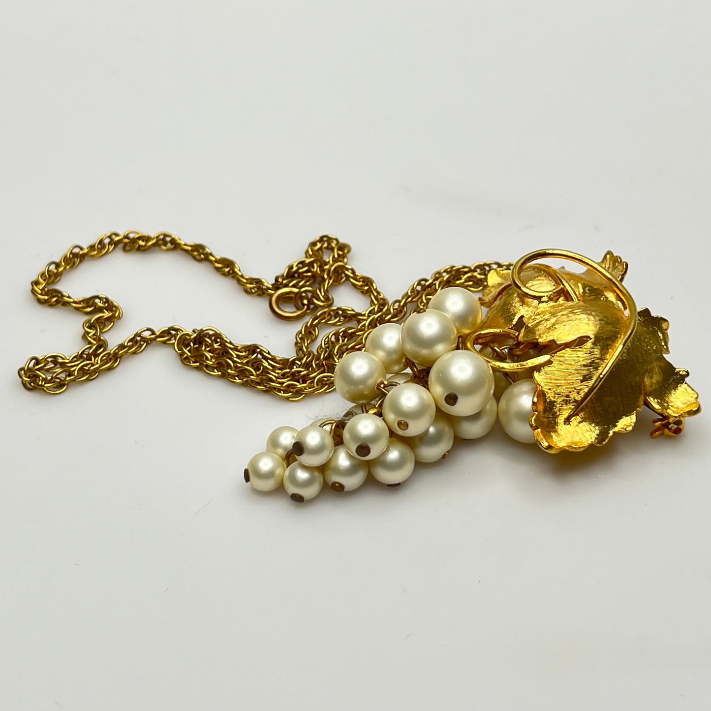 Vintage gold-tone grape cluster pendant brooch and faux pearl earrings set