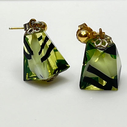 Green glass pyramid earrings with black swirl pattern, vintage 1980s pierced dangle design