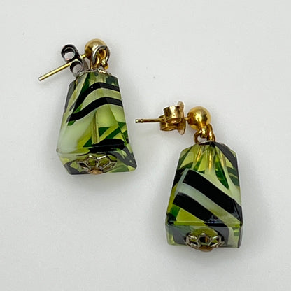 Green glass pyramid earrings with black swirl pattern, vintage 1980s pierced dangle design