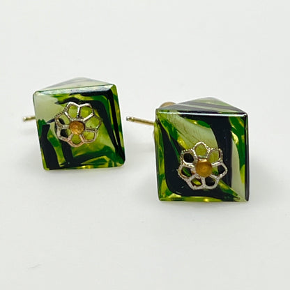 Green glass pyramid earrings with black swirl pattern, vintage 1980s pierced dangle design