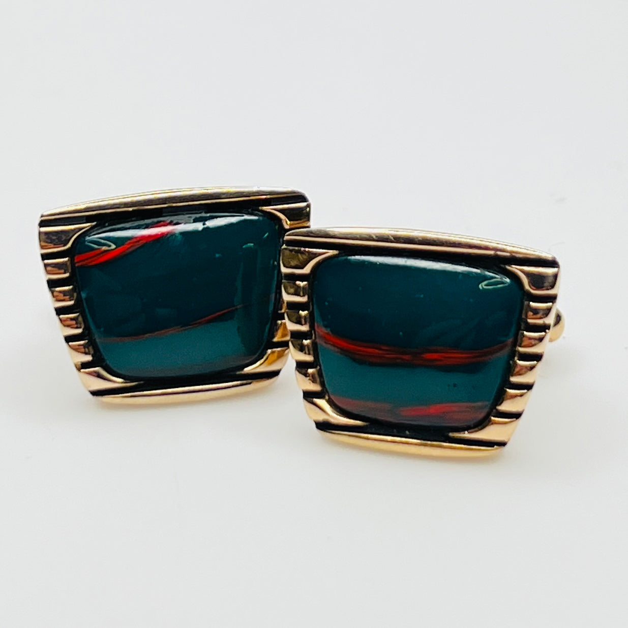 1950s Hickok cufflinks with teal glass cabochons and rose gold-tone setting