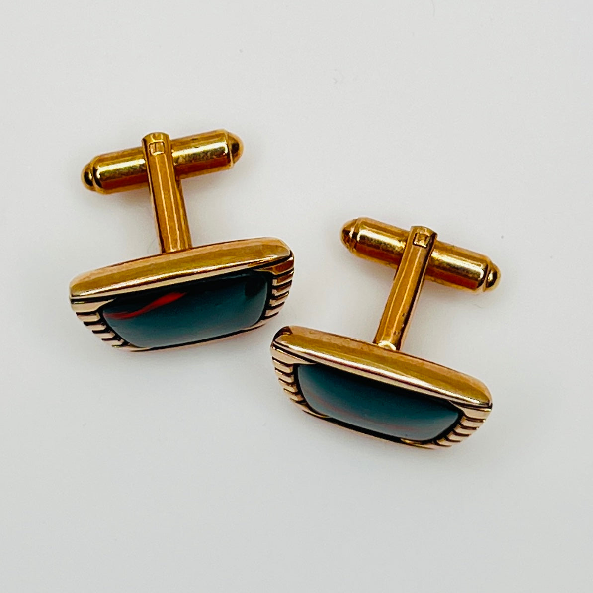 1950s Hickok cufflinks with teal glass cabochons and rose gold-tone setting