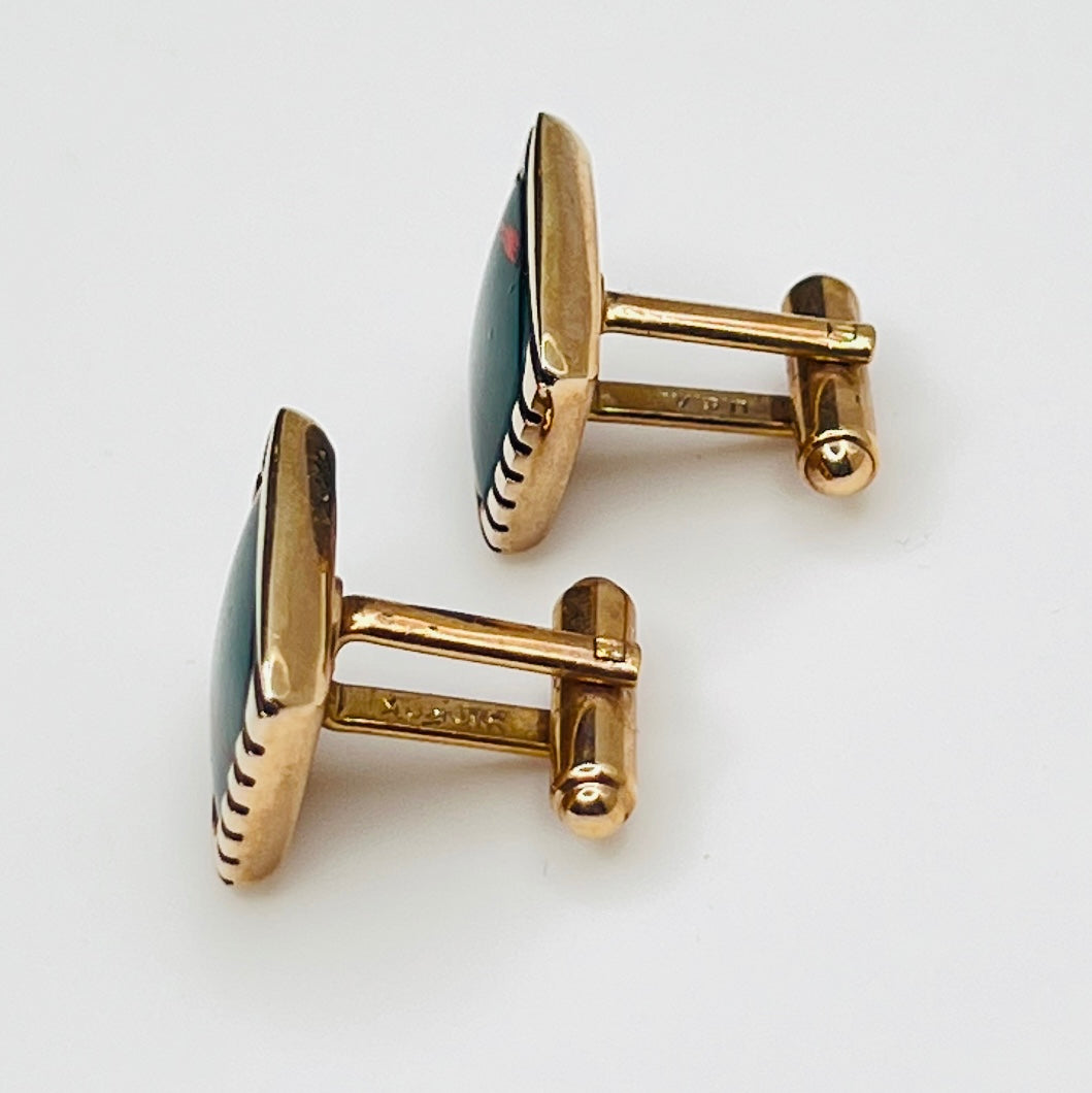 Side view showing toggle mechanism and domed glass profile