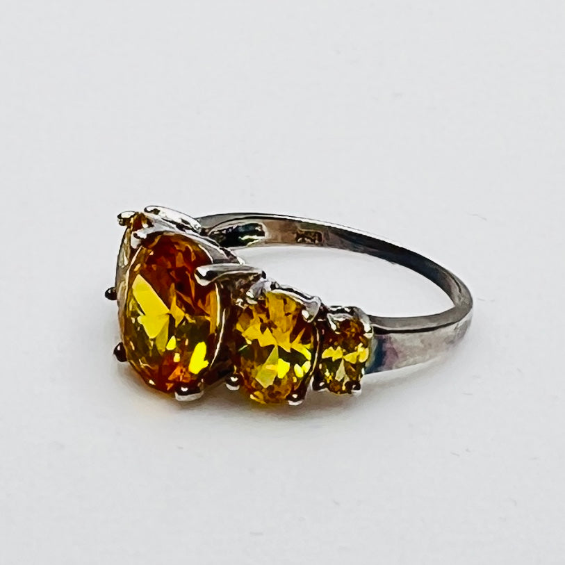 Side profile showing stone height and prong details