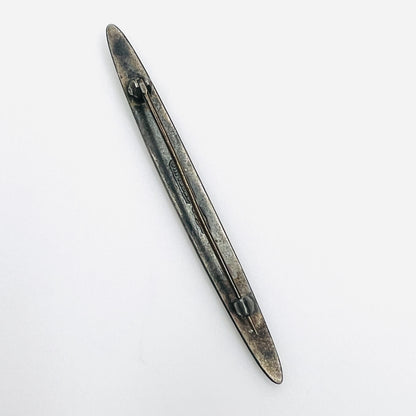 Reverse of Edwardian sterling silver enamel bar brooch with original patina