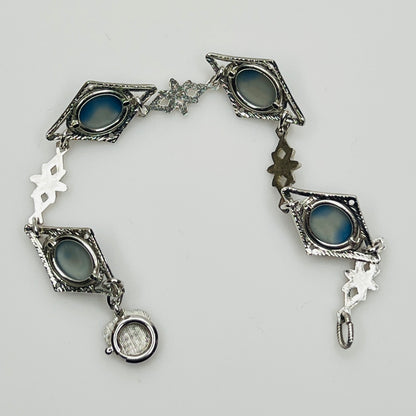 Reverse view of bracelet showing prong-set stone backs and links