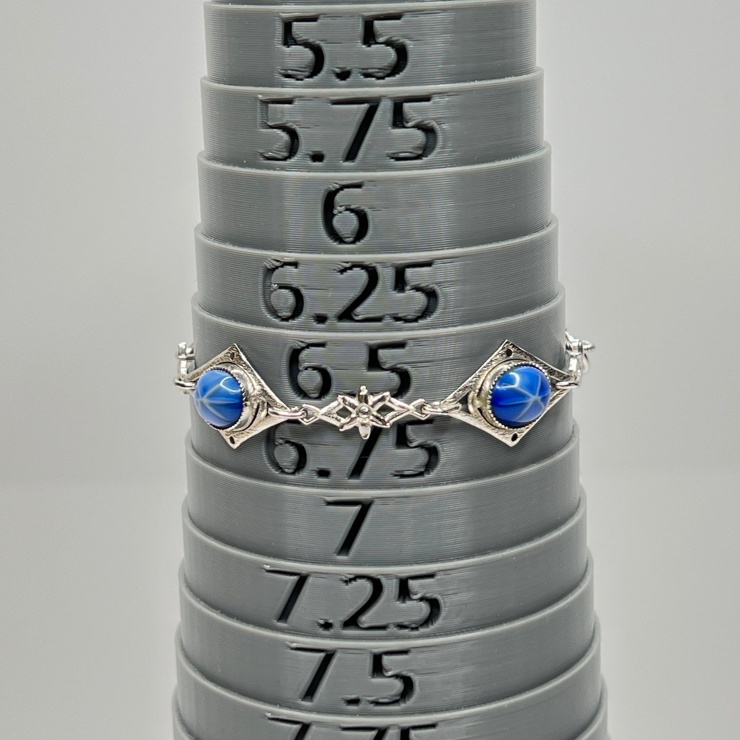 Bracelet shown on mandrel at size 6.5 with 8-inch full length