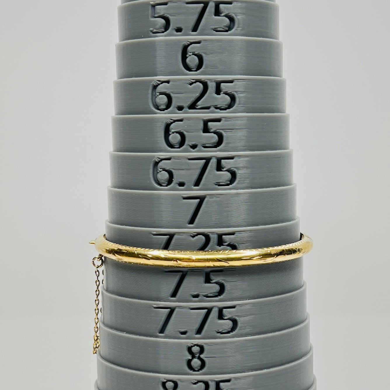 Vermeil bangle shown on bracelet mandrel at size 7.25